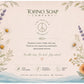 A square product packaging card for Tofino Soap Company, featuring a cream-colored background with botanical illustrations of purple lavender, yellow flowers, and green leaves. The center features a peace sign logo with the text 'Find Your Calm Naturally'.