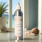 Close-up of Tofino Organic Botanical Hand Wash metal pump bottle showing natural hand soap formula with wild-foraged ingredients