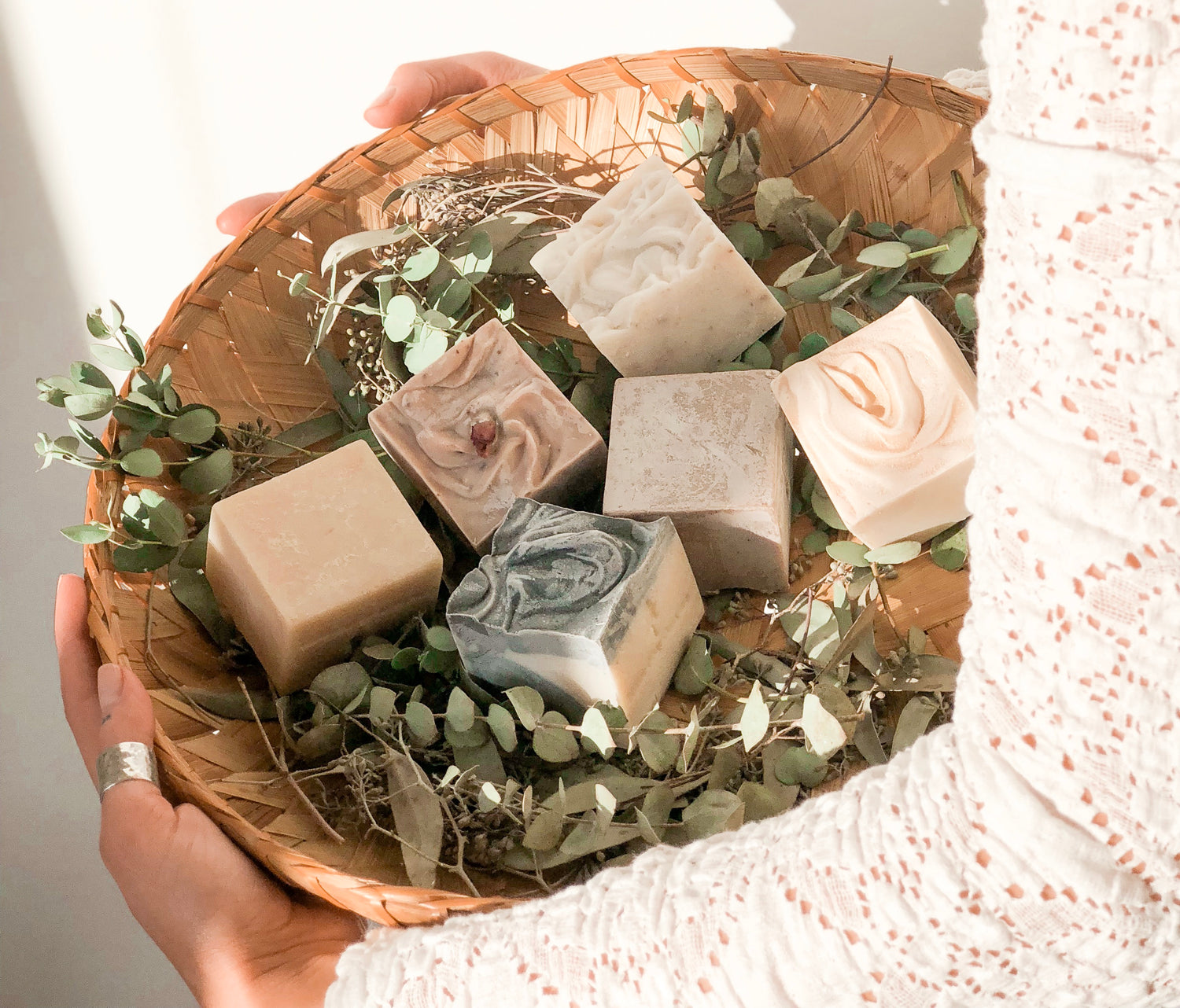 handcrafted soap in basket with botanicals , BC