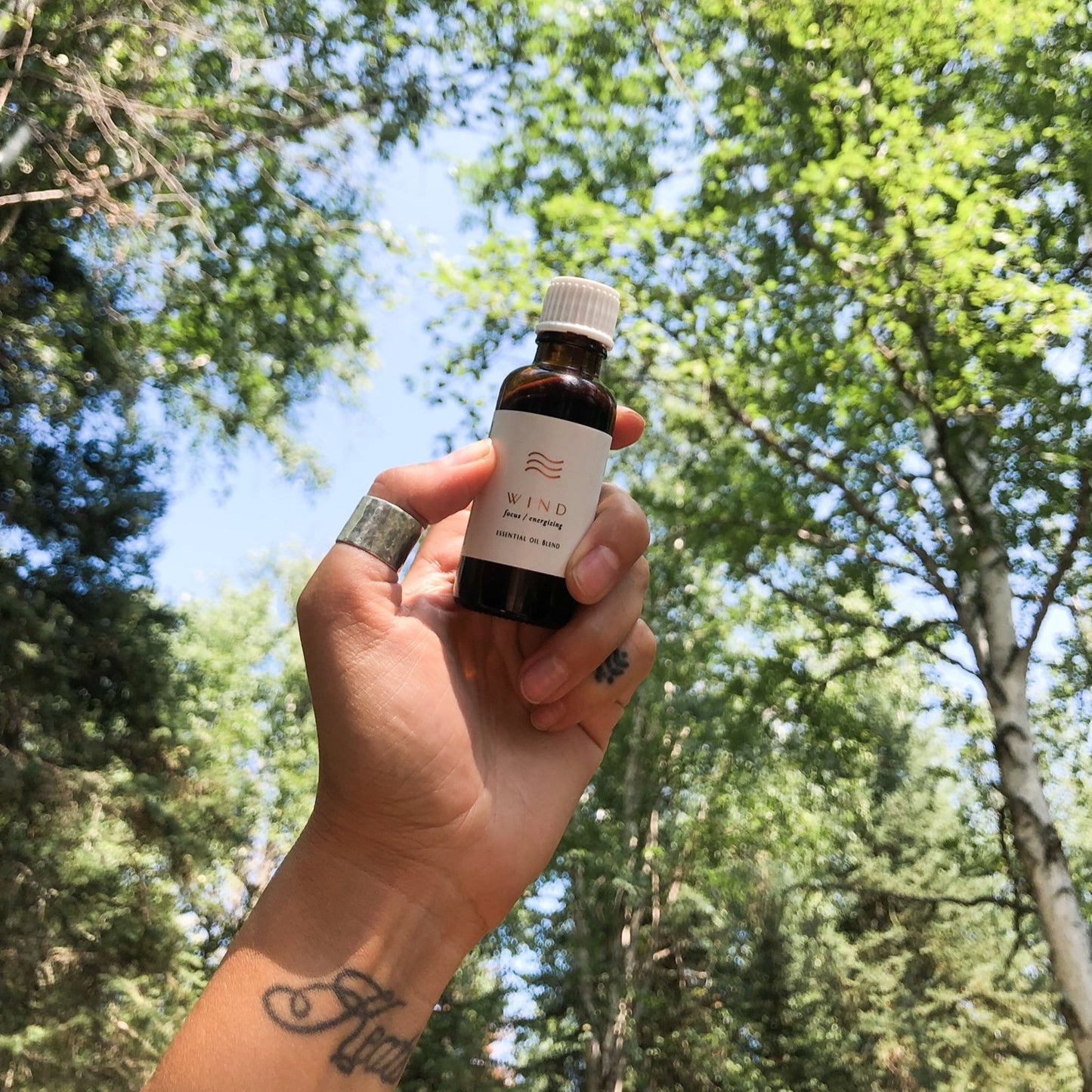 Winds essential oil blend in amber bottle, by Tofino Soap Company